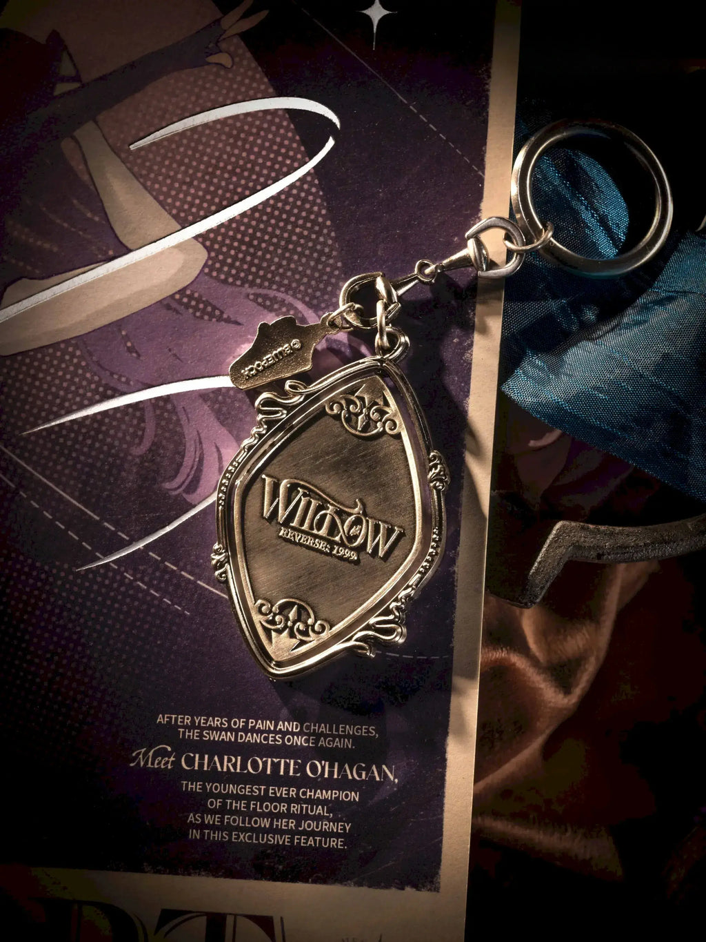 Reverse: 1999 - Wings Unfurled Series Willow Magazine Clipping & Metal Bag Charm BLUEPOCH